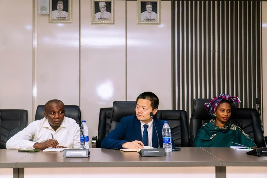 Delegates and international partners seated at a session in the Energy Commission boardroom